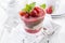 Traditional sweet strawberry dessert with yogurt in a glass