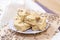 Traditional sweet turkish delight halva pieces with sunflower seeds on light background.