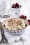 Traditional Swiss cherry pie with meringue topping in a baking form