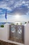 A traditional symmetric door yard, Ia, Santorini, Greece. Honeymoon summer aegean cycladic background.