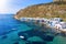 The traditional syrmata fishing village of Klima , Milos island, Cyclades, Greece