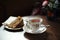 Traditional tea and cake on wooden cafe table