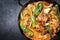 Traditional Thai kaeng massaman coconut chicken curry with jalapeno, poblano chili and sweet potatoes