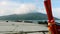 Traditional Thai Long Tail Boats Moored on Beach with Green Tropical Island