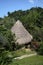 Traditional thatched building with a straw roof, of the indigenous people of Colombia, South America