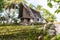 Traditional thatched yapese men`s meeting house faluw or fale. Yap island, Micronesia, Oceania.