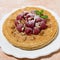 traditional thin pancakes with fresh raspberries, closeup