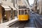 Traditional tram moving on street