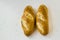 Traditional Turkish Breads with sesame and black cumin on a white surface