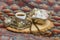 Traditional Turkish delight in traditional bowl with Turkish coffee. Fabric background.