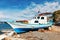 Traditional Turkish fishing boat ashore for maintenance