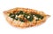 Traditional turkish pizza pide with spinach on white. Top view.