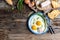 Traditional Ukrainian or belorussian food. Breakfast, lunch bacon, lard fried eggs and toast on old wooden table. banner, catering