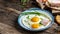 Traditional Ukrainian or belorussian food. Breakfast, lunch bacon, lard fried eggs and toast on old wooden table. banner, catering