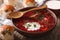 Traditional Ukrainian borsch soup close up in a bowl. horizontal