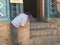 Traditional Uzbek mason working in front of a religious building to Samarkand in Uzbekistan