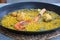 Traditional Valencian cuisine. The national Spanish dish of Valencia is Paella Valencia. Tasty lunch in a Spanish restaurant.