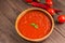 Traditional vegetable gazpacho. Wooden rustic background. Top view