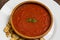Traditional vegetable gazpacho. Wooden rustic background. Top view. Close-up