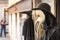 Traditional venetian mannequin in Plague doctor costume, mask and hat