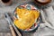 Traditional Venezuelan beef cachapa on wooden table