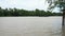 Traditional Vietnamese boat sailing on the Mekong River in the Mekong Delta, Vietnam