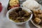 Traditional Vietnamese Bun Cha meal with soup, meat and fried springrolls