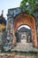 Traditional vietnamese entrance door in the imperial city, Hue, Vietnam, on a foggy day.