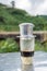Traditional Vietnamese milk coffee with mountain forests background