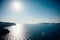 Traditional view of the island of Santorini with blue sea, sky, sunset