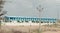 A Traditional warehouse buildings and powerline and sky clouds Thar Desert Bikaner Rajasthan India landscape nature