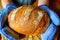 Traditional wheat and rye bread in hands