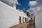 Traditional white houses and narrow street in Lanzarote Spain