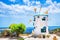 Traditional white windmill at summer day