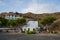 Traditional Whitewashed Greek Fishing Village House with ATV in