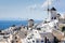 Traditional windmills in village Oia of Santorini