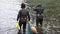 Traditional Women-Divers at Jeju Island, also Called as Haenyeo, Gathering Shell-fish in the Sea