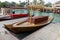 Traditional wooden arabic boat tied to pier in Madinat Jumeirah