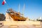 Traditional wooden arabic ship in historical museum in Dubai