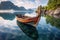 traditional wooden boat anchored near an untouched island