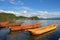 Traditional wooden boats floating in the Lugu Lake, Yunnan, China