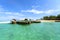 Traditional wooden boats with turqiouse ocean in Zanzibar, Tanzania, Africa. Holidays in Africa.