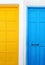 Traditional wooden colorful doors - blue and yellow - at Ano Koufonisi island Greece