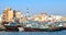 Traditional wooden Dhows moored on the creek in Dubai in the district Deira