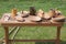 Traditional Wooden Dishes on a Table Outdoor