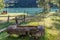 A traditional wooden drinking trough near the shore of Lake Maen, Aosta Valley, Italy