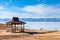 Traditional wooden gazebo on the shore of Lake Baikal