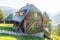 Traditional wooden house on a hillside in Kusturica Drvengrad in Serbia