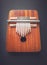 Traditional wooden kalimba isolated on black