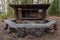 Traditional wooden lean-to shelter in a Finnish forest